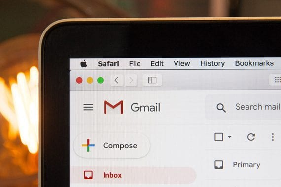 Image of a smartphone screen with the Gmail icon prominently displayed