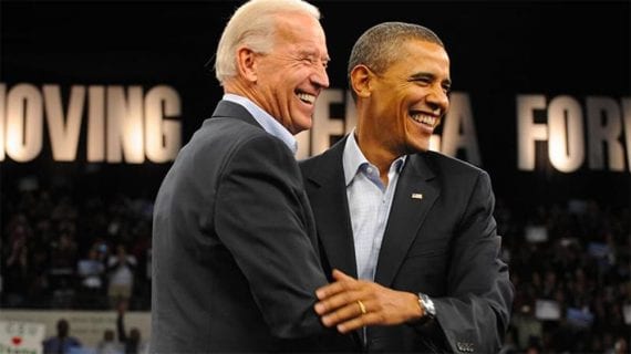 Photo of Joe Biden and Barack Obama laughing.