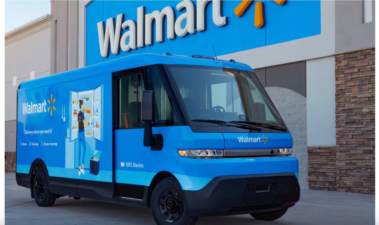 Photo of a BrightDrop electric van in front of a Walmart store