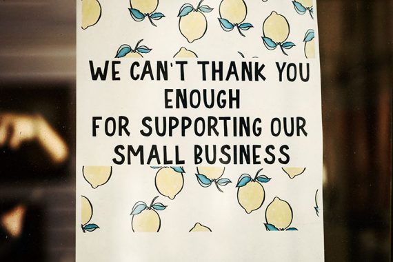 Photo of sign reading, "We can't thank you enough for supporting our small business."