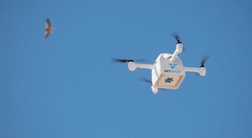 Photo of a SkyDrop drone in flight.